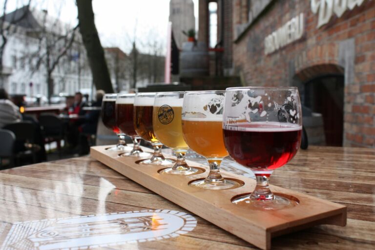 multiple beers on a tasting board